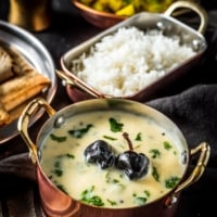 Gujarati Kadhi served with rice, potato sabzi and rotis
