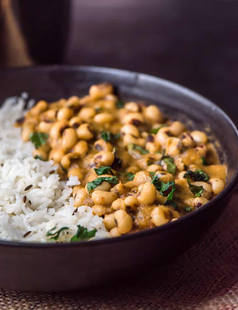 Black-eyed peas curry or lobia masala is a simple yet flavorful curry that pairs well with rice and roti. This particular legume curry might soon become you favorite Indian curry – it is healthy and satisfying.