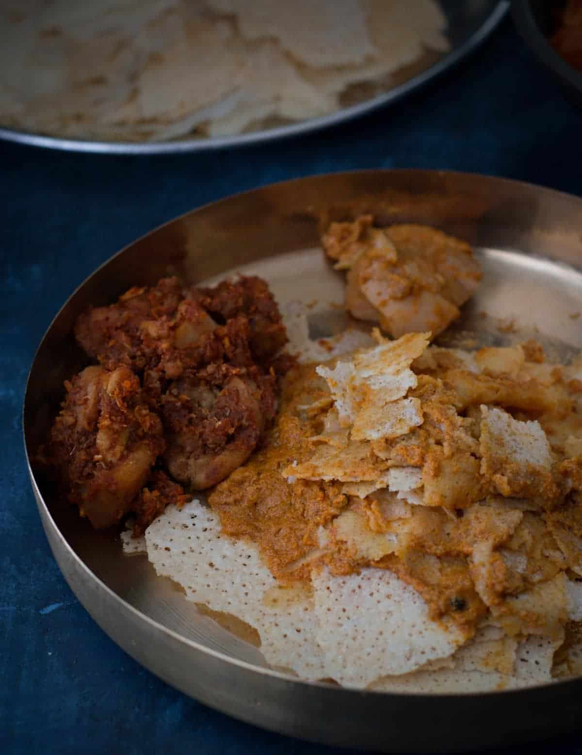 Kori rutti served with pieces of kori ajadina in a bronze plate