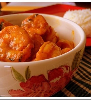 Shrimp curry served in a bowl with floral patterns