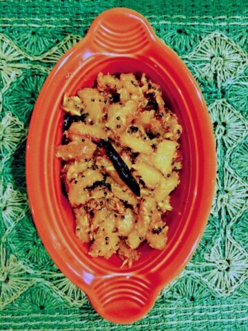 Pineapple Bhaji served in a brown ceramic bowl