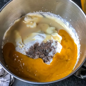 Mango ice-cream ingredients in a steel bowl