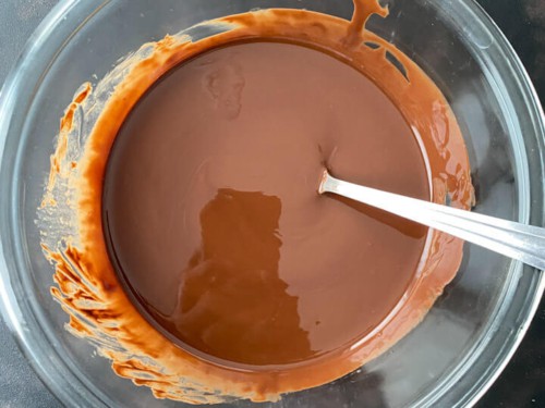 Chocolate sauce in a glass bowl