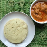 Buttermilk dosa served with chicken curry