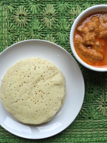Buttermilk dosa served with chicken curry