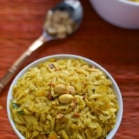 Poha Chivda served in a white bowl