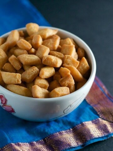 Shakarpara served in white bowl
