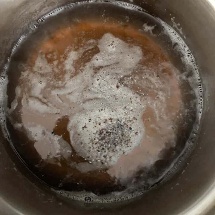 Oil heating in a pan.