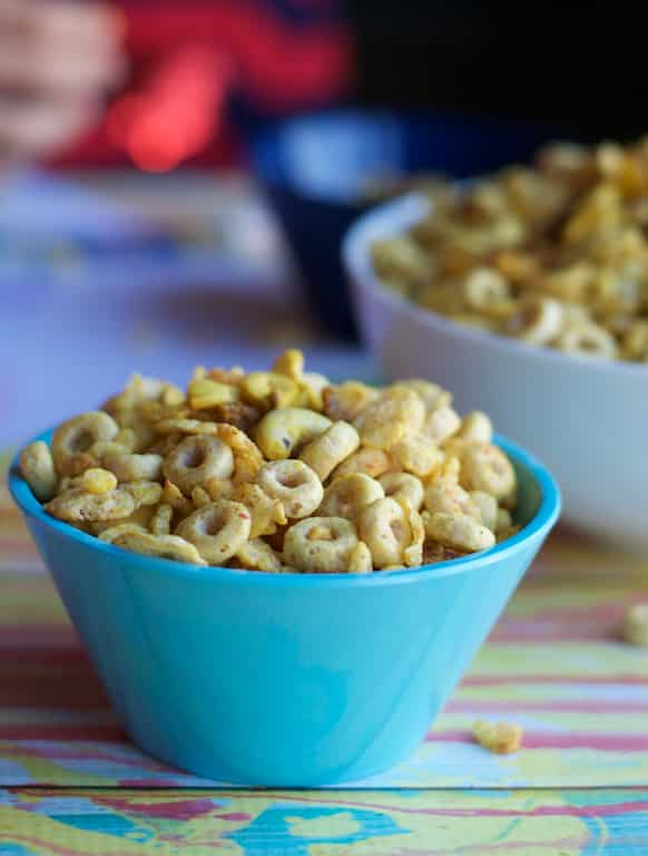 Cheerios corn flakes served in a blue and white bowl