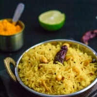 Lemon rice served in a steel bowl