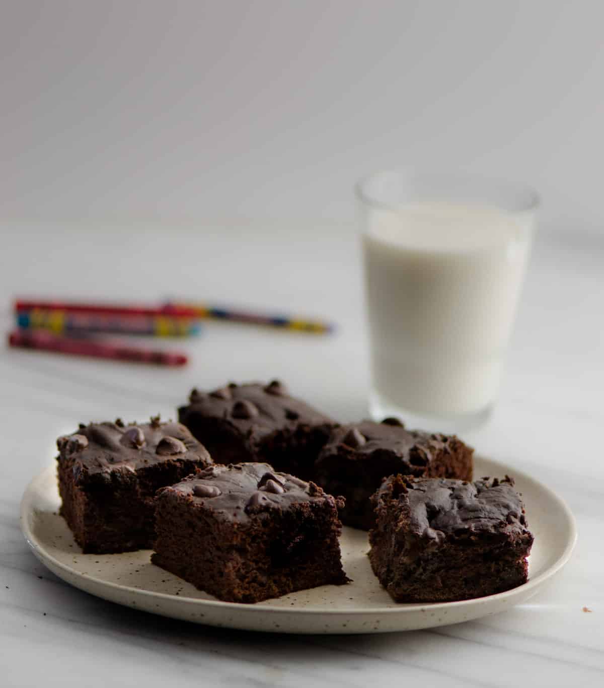 This delicious and moist Chocolate Banana Cake recipe filled with the goodness of coconut oil and banana makes for a healthy after school treat for kids. Make this 30-minute fuss-free cake using a blender.No stand in mixer required.
