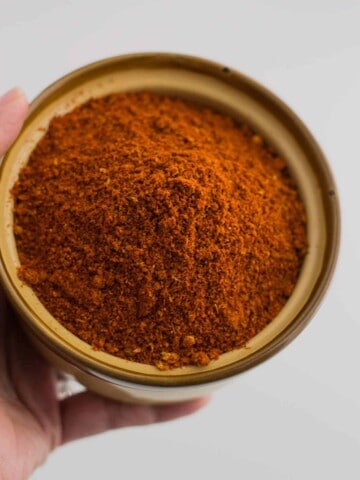 An overhead shot of Kundapur Masala in a brown bowl