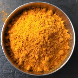An overhead shot of turmeric powder