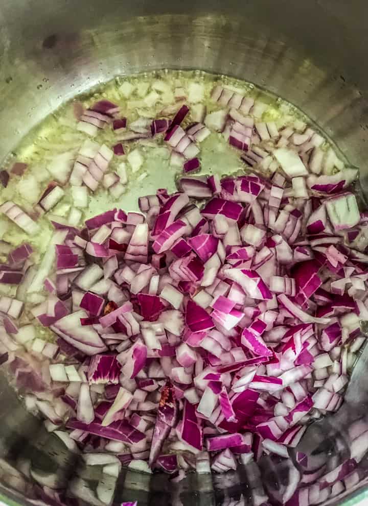Red onions added to hot oil in Instant Pot