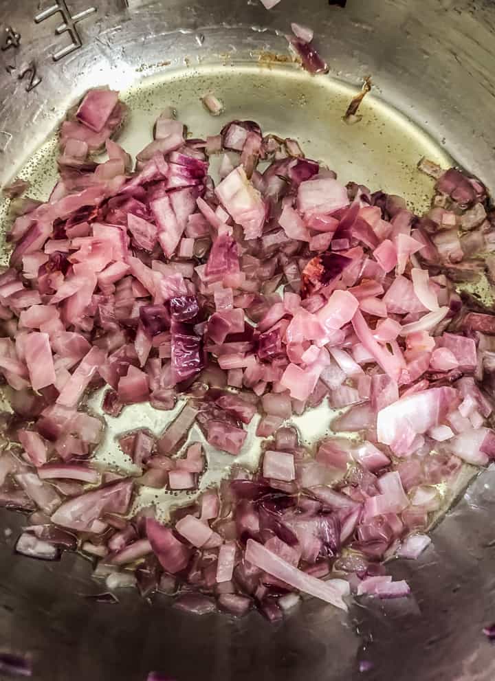 Fry the onions till they are soft and translucent