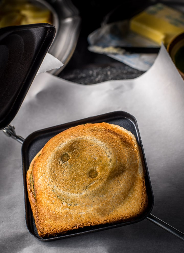 Grilled sandwich toasted on a stovetop sandwich maker