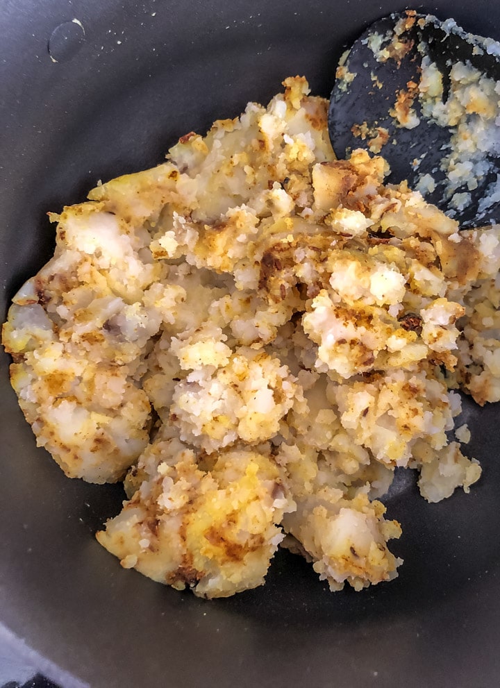 Mashed potatoes added to the spices