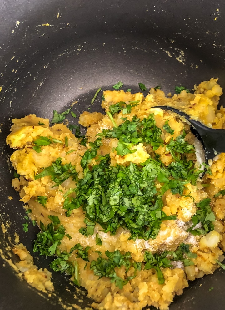 Cilantro and lime juice added to the spiced mashed potatoes