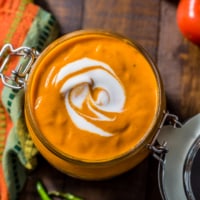 Overhead shot of Tikka Masala Sauce served in glass jar