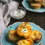 Leftover mashed potato muffins stacked on a blue plate