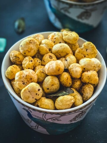 Two white bowls filled with fox nuts