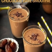 A chocolate date smoothie with a white bowl of dates to the left, yellow and white straws to the right, another chocolate date smoothie behind the first and the words Healthy and Delicious Chocolate Date Smoothie at the top.