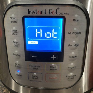 Preheating the instant pot pressure cooker.