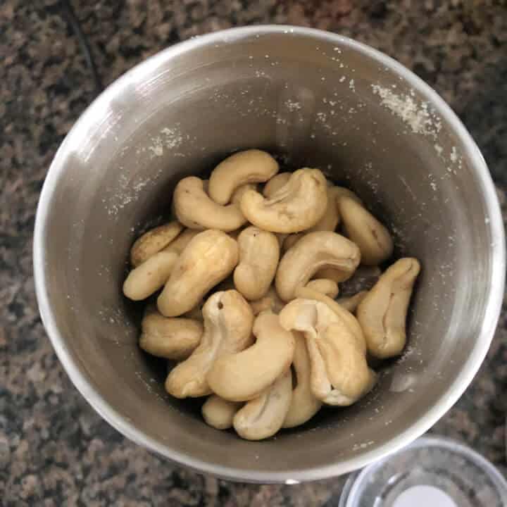 Unsalted cashews in a spice grinder