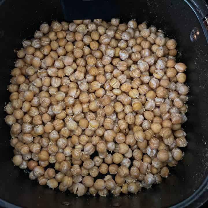 Chickpeas in the air fryer after cooking for 20 minutes.