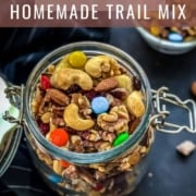 A glass jar with homemade trail mix and the title how to make homemade trail mix at the top.