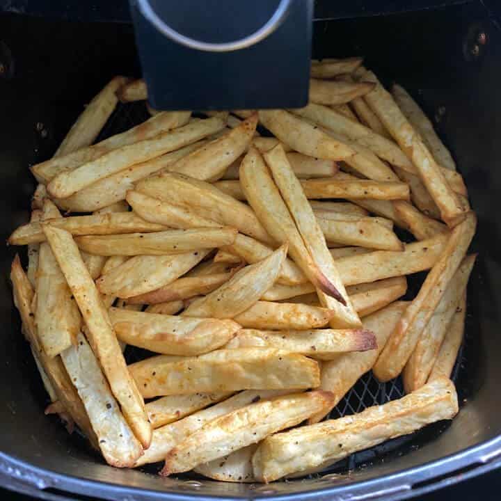Air fryer sweet potato fries after cooking in the air fryer.