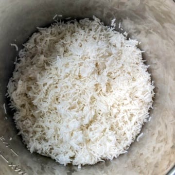drained basmati rice added to instant pot insert