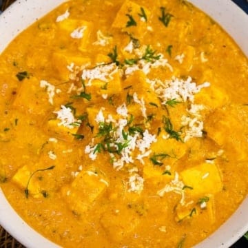 Paneer lababdar served in a white bowl