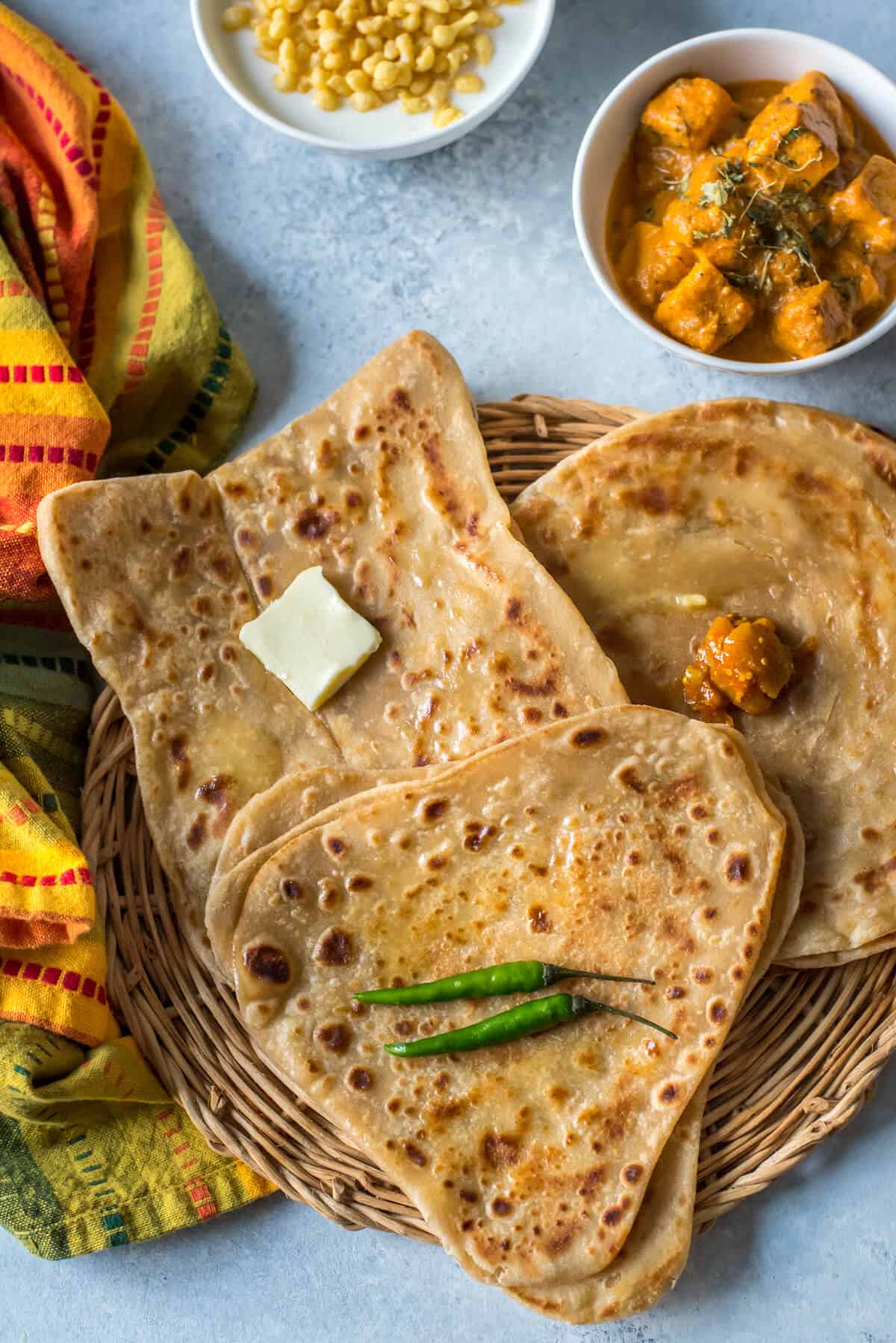 A selection of a variety of shapes of paratha.
