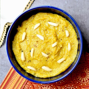 Badam halwa served in a blue bowl