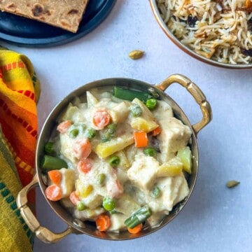 Veg korma in a bowl.