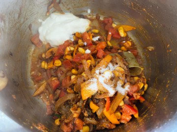 Yogurt added to pressure cooker with veg.