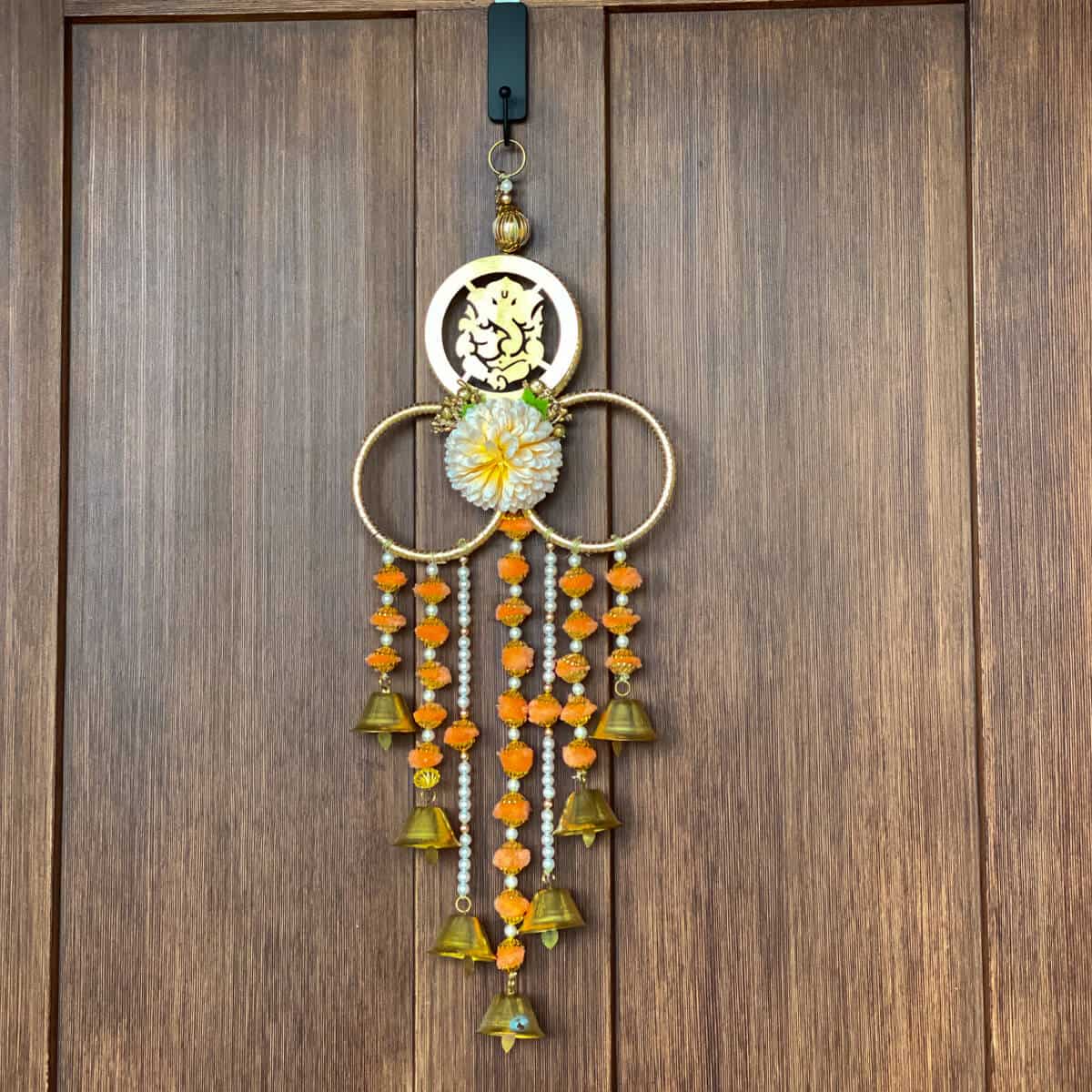 Front door hanging with Ganesha on it