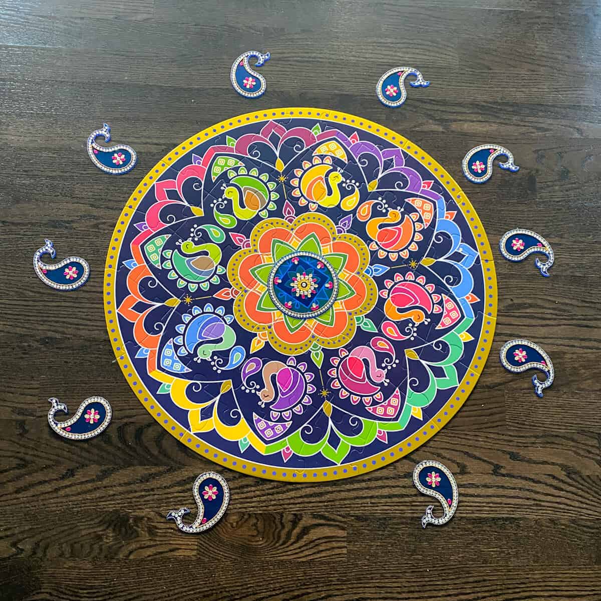 A colorful rangoli made from a puzzle
