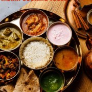 A circular plate with Indian food with caption A complete guide to Indian cooking tools