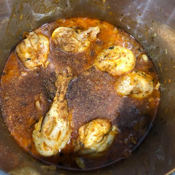 Chicken drumsticks in Instant Pot sprinkled with garam masala